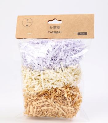 China Multicolor Grass Shredded Raffia Fold Paper Shred Filler Set ANTISTATIC Easter Tissue Paper Tissue Paper for sale