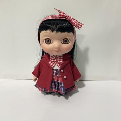 China Toy New Porcelain Doll collectible in fabric clothes for home decoration hair with bow for sale