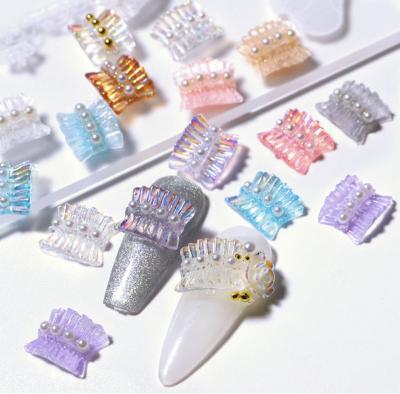 China New luxury nail aurora nail accessories small D skirt pearl accessories lace up nail decorations for sale