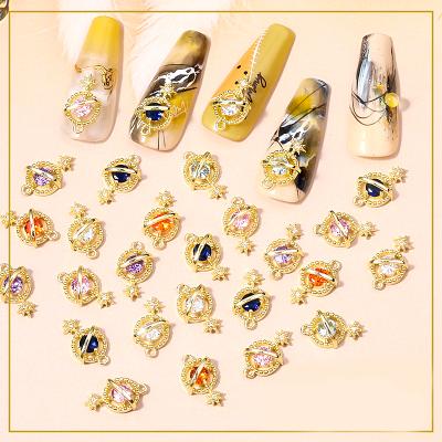 China New Luxury Nail D Planet Zircon Jewelry Saturn Jewelry Planet Nail Charms for sale