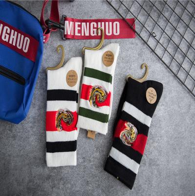 China 2021 hot sale embroidery tiger head horizontal bar sports couples socks women cotton socks tube sports socks for sale