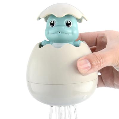 China Amazon Hot-selling Plastic Baby Educational Bath Toys ABS Amazon Animal Toys Pour Spray Water Dinosaur Eggs Baby Bath Toy for sale