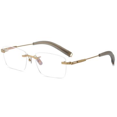 China High Quality Titanium Rimless Optical Eye Glasses Retro Sight Glasses Glasses For Men And Woman CS80817 for sale