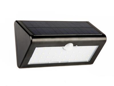 China Solar power PIR motion Sensor LED Wall light outdoor garden light waterproof for sale