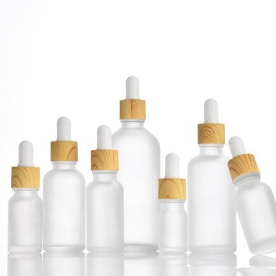 China Hot Selling Cosmetic 100ml 50ml 30ml 20ml 15ml 10ml 5ml Frosted Matte White Black Amber Glass Essential Oil Dropper Bottle for sale