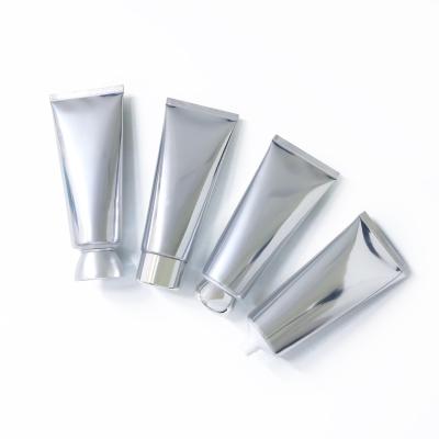 China Accept Customized Bright Silver Aluminum Plastic Empty Packaging Facial Tube Designs 100g Washing Plastic for sale