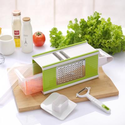 China Eco-Friendly Sustainable Slicer Chopper Box Magic Vegetable Grater With Food Holder for sale