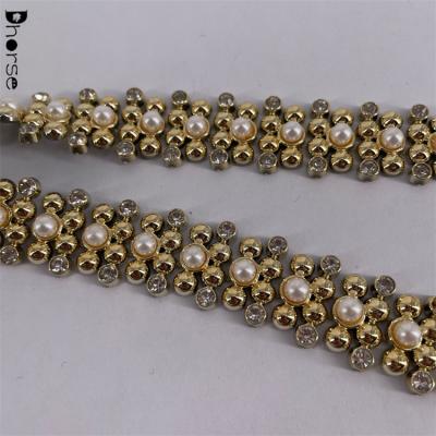 China Bling bling glitter hot sales gold plastic pearl trimming for garment for sale