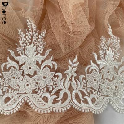 China Viable Fancy White Beaded Sequins Border Embroidery Designs Flower Lace for sale