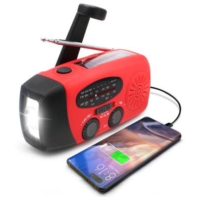 China Newest 2000 mAh Solar Powered Hand Crank Radio PORTABLE Fm AM Noaa Time Alert Rechargeable Handheld Radio With Led Flashlight for sale