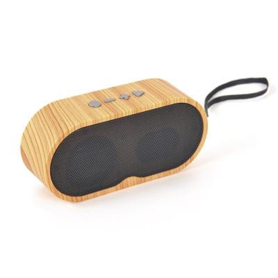 China Mini Wood Grain Retro Colorful Wireless Bass Outdoor Portable Wireless Stereo Speaker for sale