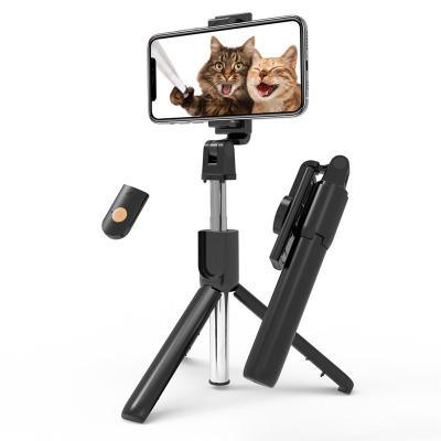 China 2020 Mini Portable Collapsible Foldable Portable Tripod Folding Selfie Smartphone Selfie Stick Wireless Remote Tripod for sale