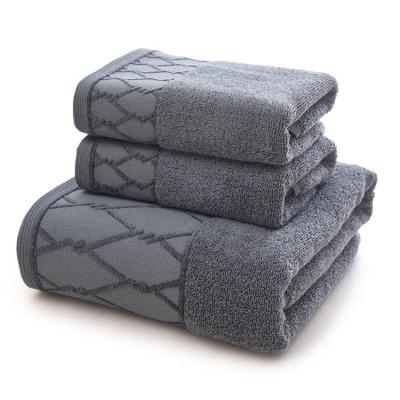 China Compressed Dobby Luxury 5 Star White Terry Cotton Hotel Spa Body Wrap Bath Towels for sale