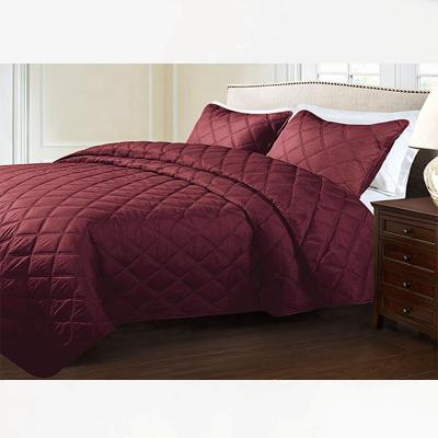 China Solid Color Anti-static Wholesale Soft Bed Cover Satin Quilting Comforter Set for sale