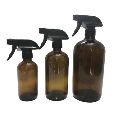 China Personal Care 16oz Amber Boston Round Spray Glass Bottle With Poly Cone Cap And Chalk Labels for sale