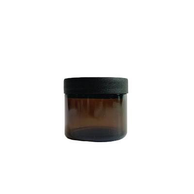 China Personal Care 2oz Straight Sided Round Amber Glass Body Butter Sampling Jar With Matte Black Plastic Lid for sale