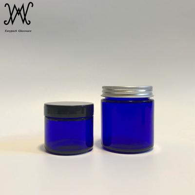 China Personal Care 4 Oz Straight Sided Cobalt Blue Glass Cosmetic Jar With Silver Aluminum Metal Lid for sale