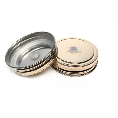 China Non Spill 70mm Plated Stainless Steel Metal Lid With Straw Hole And Silicone Ring For Mason Jar for sale