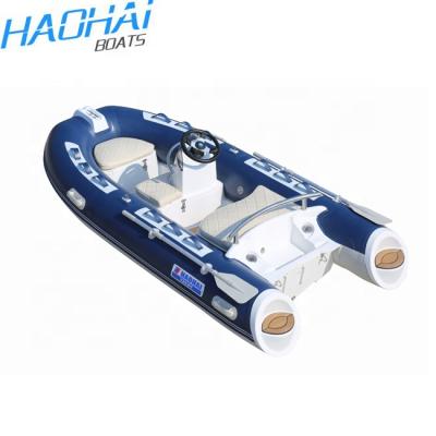 China Fiberglass Hypalon RIB 330 Bule Dark RIB With Center Console Fiberglass Used Fishing Inflatable Boat For Sale for sale