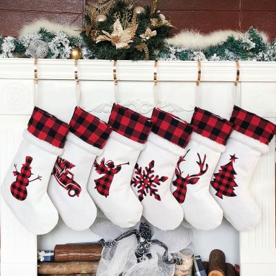 China Original Silhouette Buffalo Fleece Design Red and Black Fireplace Stocking Christmas Plaid Hanging Decoration for sale