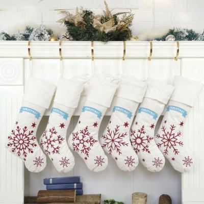 China 2021 New Design Northern Europe Polyester Snowflake Original Christmas Stocking Fireplace Hanging Decoration for sale