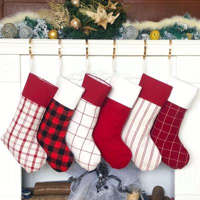 China Original Design Cotton/Canvas Buffalo and Stripes Christmas Hand-sewn Rustic Plaid Stockings for Family Mantel Decor for sale