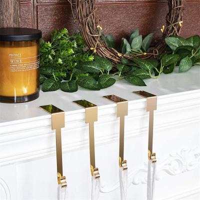 China Gold Metal Design Non-slip Christmas Stocking Holder Hanger Hooks Fireplace T Style for sale