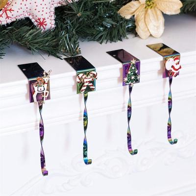 China Rainbow Color Metal Design Non-Slip Christmas Stocking Holder Hanger Hanger Fireplace Set of 4 for sale