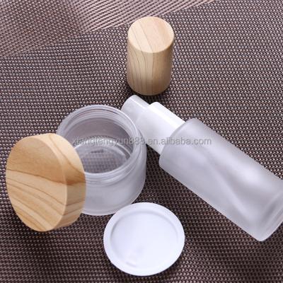 China Cosmetic Custom Luxury Color Transparent Oval Bottle Glass Creams Cosmetic Bottle Packaging for sale