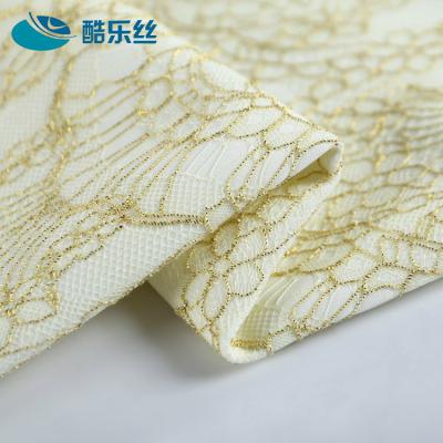 China 2018 Viable New Design Popular Yellow Polyester Yarn Compound Bonded Fancy Guipure Embroidery Lace Fabric for sale