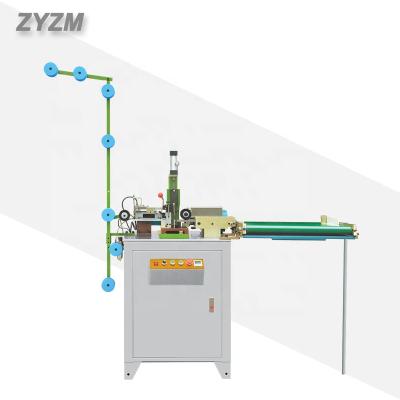 Cina Clogged zipper tutting automatic zipper zigzag cutting machine for metal, nylon, plastic, invisible zipper making in vendita