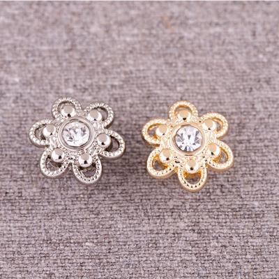 China Customized hot sale metal flower shape rivet buttons on sale from garment coat handbags factory directly for sale