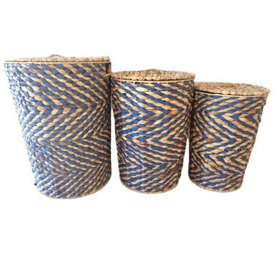 China Sustainable Making Around Blue Woven Round Household Items Storage Handicraft Cattail Basket Dress Storage Basket for sale