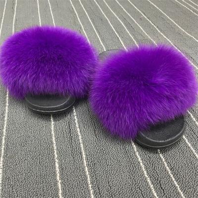 China Fashion Trend Top Level Hot Sale Real Fur Crazy Slippers For Women Extra Fluffy Fur Slides Raccoon Fur Slides for sale