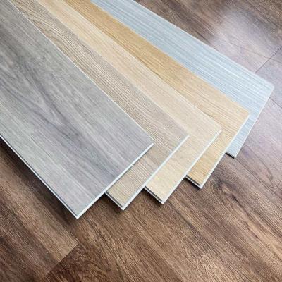 China Eco-friendly Material fireproof wooden tiles floor click pvc vinyl floor spc flooring for Indoor for sale