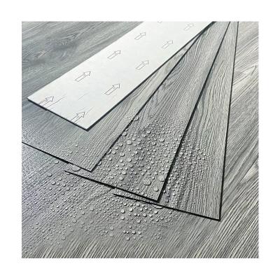 China Inoxidable madera de lujo azulejos de PVC Lvt suelo autoadhesivo Vinyl suelo peeling y pegado Pvc tablón de suelo en venta