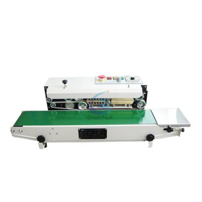 China Continuous Hot Food Pressing Plastic Bag Pouch Sealing Machine for sale