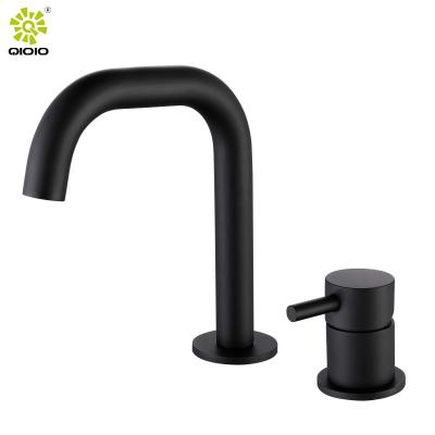 China Metered Faucets New Arrival Hot - Selling 304 Stainless Steel Two Hole Hot And Cold Bathroom Basin Faucet for sale