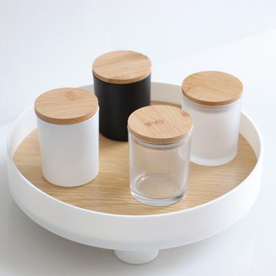 China Gift & Craft Wholesale Frosted Glass Candle Jars With Wooden Lid For Home Direction And Gift for sale