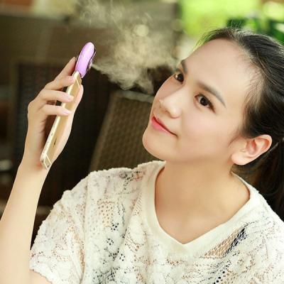 China Mini Mobile Phone Mist Moisturizing Beauty Instrument Portable Water Replenishment Mini Humidifier Facial Water Spray for sale