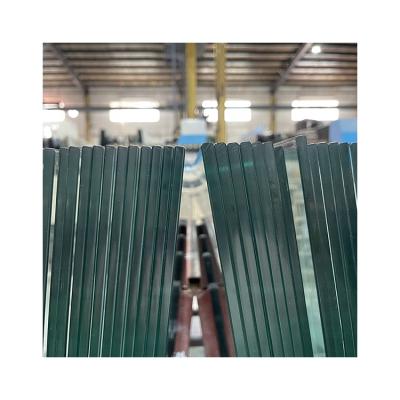 China Safety Glass Price 15mm Hotel Tempered Glass For Commercial Building Door for sale