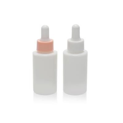 China 30ml Cosmetic Opal White Glass Dropper Bottles 30ml 1oz Cylinder Glass Bottle With Pink Dropper Cap For Serum Essential Oil for sale