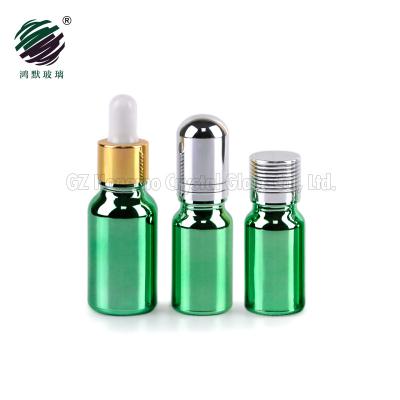 China 10ml 15ml Recyclable Material Luxury Shiny Green Plated Glass Dropper Bottle With Silver Dropper Caps for sale