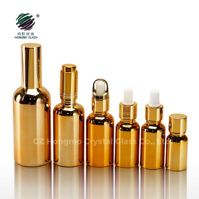 China Material 100ml 50ml 30ml 20ml 15ml 10ml 5ml Recyclable Empty Cosmetics Perfume UV Electroplating Gold Plated Glass Bottles For Essential Oil for sale