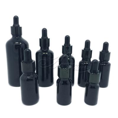 China 10ml 15ml 20ml 30ml 1oz 50ml 100ml Matte Color Matte Black Glossy Dark Violet Glass Cosmetic Bottle Essential Oil Black Bottles for sale