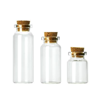 China Recyclable Material Small Empty Clear 10ml 10ml Corked Glass Vials Bottles With Cork Stopper For Lab Test Sample Medicine Packaging for sale