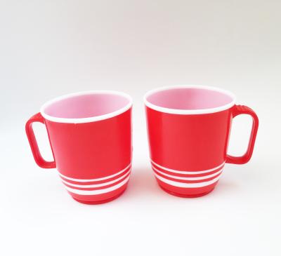 China Stocked High Quality Fashionable Plastic PP Coffee Cup Drinkware Cup With Handle for sale