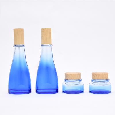 China Empty 40ml lotion bottle 120ml pump glass bottles 50g cosmetic cream jar cosmetic bottle with wooden grain cover for sale