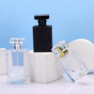 China Cosmetic Luxury Square Black Square Glass 50ml 100ml Fine Empty Perfume Bottle 1 Ounce Perfume Mist Clear Spray Bottle With Acrylic Cap for sale