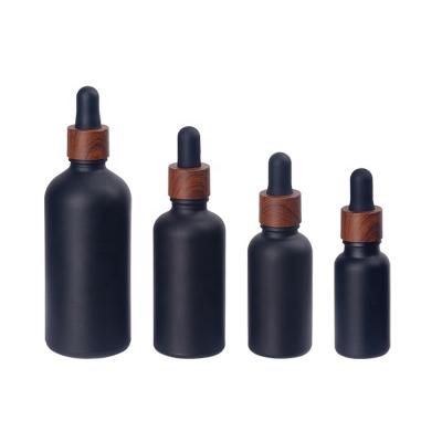 China Matte Black Empty Essential Oil Cosmetic Bottle 10ml 5ml 30ml 100ml Dropper Bottles Glass Essential Oil Bottle With Dropper for sale